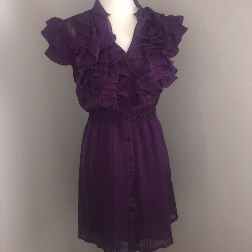 Dress with beautiful ruffles and back tie.